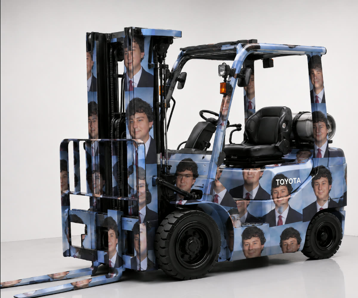 Toyota forklift wrapped in a repeating portrait of Chris Ilic