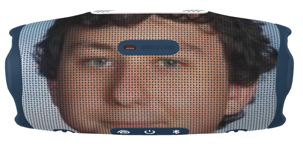 Portable bluetooth speaker wrapped in a halftone print of Chris Ilic